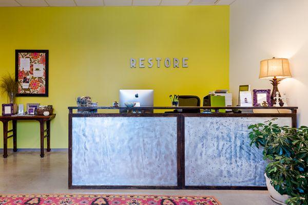 When you come to Restore, you will be greeted by our front desk.