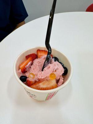 Strawberry ice cream with toppings