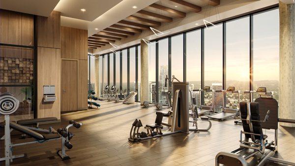 Top-floor fitness center with dedicated yoga and barre area