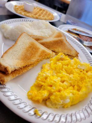 Scrambled eggs, toast, grits.