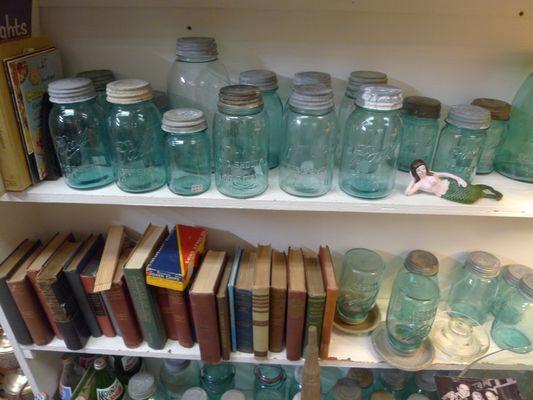 Old books and vintage canning jars.