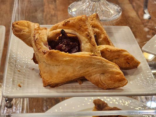 House-made puff pastry with wine reduced pears.