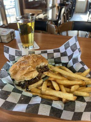 Mushroom Swiss burger with great fires and a Coors