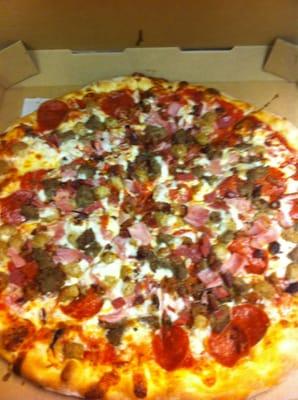 Meat pizza. Pepperoni, ham, salami, bacon, meatball, sausage (not pellets).