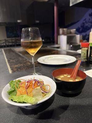 Appetizer - first course salad and miso soup with a glass of Plum Wine