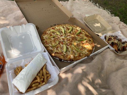 Chicken nacho avocado pizza, the east side club with fries, and sweet Thai chili wings.