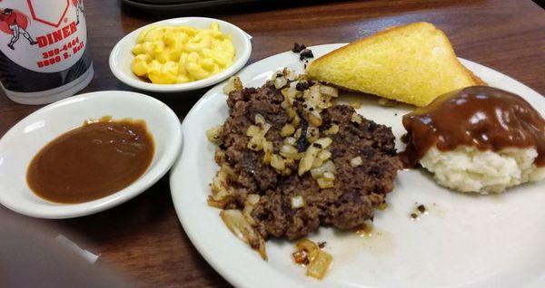 Nightly special hamburger steak, mashed potatoes, mac and cheese, gravy, tea, $8.99 for all. Tasted very good!