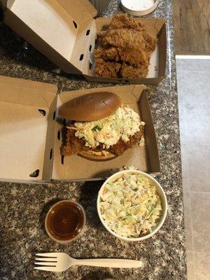 Spicy Clucker with side of coleslaw and three Chicken Thighs. The hot sauce was Amazing!