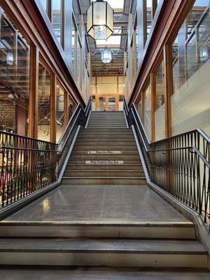 Stairs from Main street entrance. Go to the second floor and make a left. Dr. Valencia office is across from Bliss Organic Day Spa.