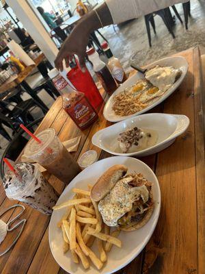 Brunch burger with fries and homemade ranch and the country fried chicken plate . Drinks- cookies and cream latte  Salted caramel cold brew