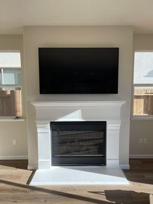 Above fireplace tv mount (wire hide)