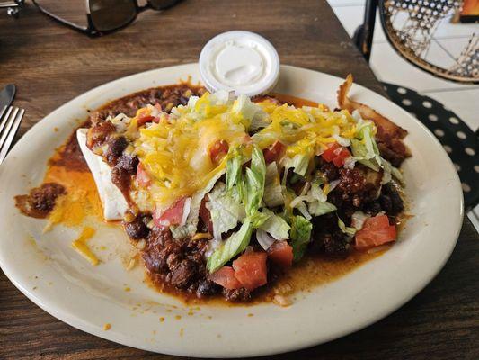 Jax In and Out Enchirito - Huge marriage of an enchilada and  beef burrito in a mildly spicy flavorful chile sauce.