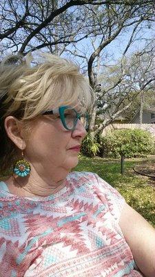 NannyJudy resting under a shade tree after walking an active puppy!