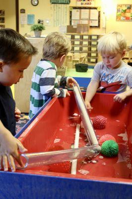 Tubes, marbles, and water equal a great morning of play.