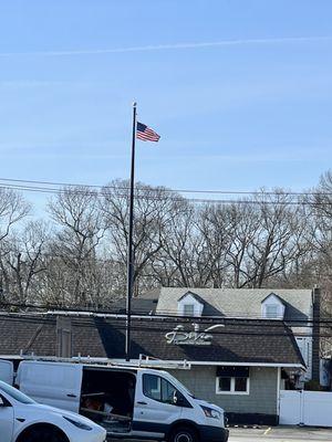 Big pole tiny flag. So sad