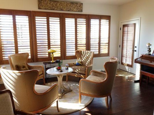 Heritance Hard Wood Shutters on windows and door by Window Happenings