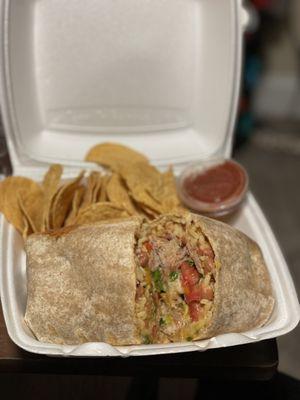 Customized pernil burrito with chips and salsa