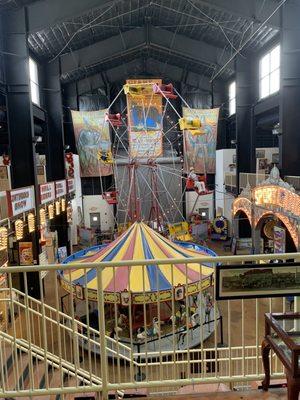 2nd floor view of the Ferris wheel and carousel.