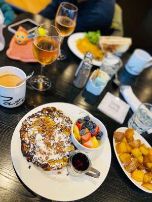 Croissant French Toast Patachou, Fresh Fruit Salad and potatoes.