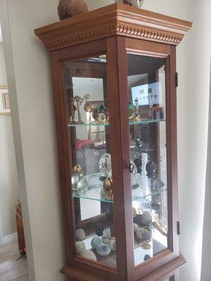 Replaced Glass.  My curio looks beautiful again!