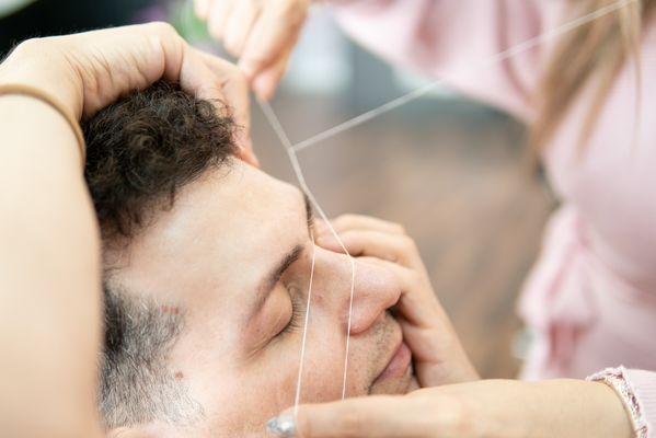 Eyebrow threading