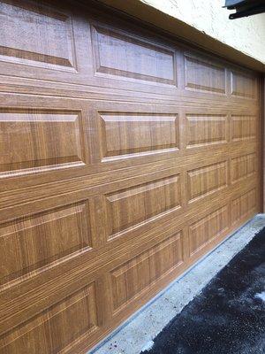 A garage door 16x7 long panel color golden oak different sizes are available.