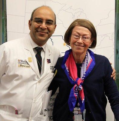 Siteman medical oncologist Ron Bose, MD, PhD, poses with a volunteer who is also one of his patients.