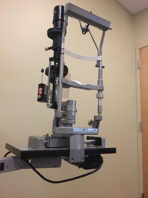 This is the machine that extracts your eyeball from your head.  Just kidding. They look at your eyes with it.