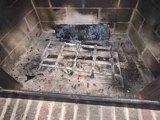 Debris was removed from smoke shelf by a different chimney specialist. All that was from before the inspection.