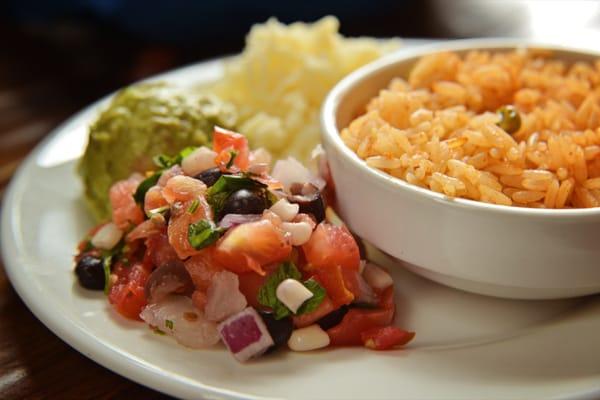 Sides for Signature Fajitas: Pico de Gallo, Homemade rice, fresh guacamole and fresh graded cheese