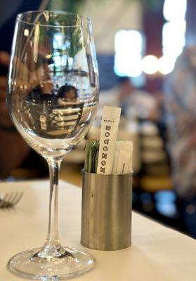 Bouchon Table with water glass  Photo by Anton N