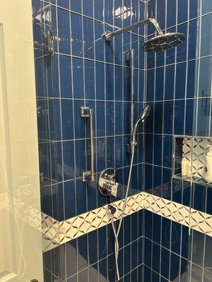 Shower renovation with handheld and grab bar installation