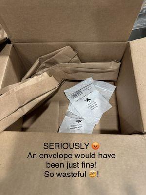 A huge box filled with stuffing and a tiny little filter that could have been mailed in an envelope!