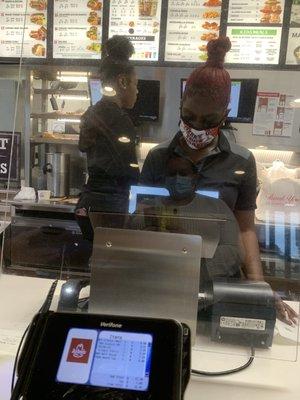 A message on the mask of the Arbys associate in Lemond, Florida stating: "merry go f***yourself".