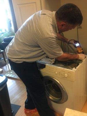 Repairing a Bosch front load washer. Call today for tips that will help your front load washer last!