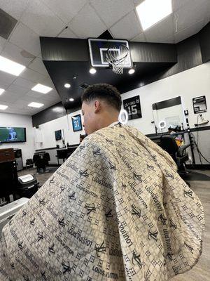 Low fade curly top