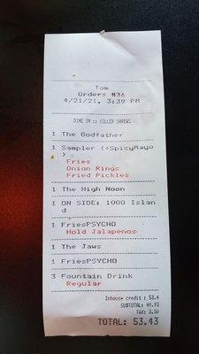 Our bill for three people. About 18 bucks per person. A little pricey, but burgers are good quality.  Sides just so-so.