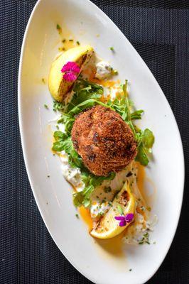 Crab Cake - panko-crusted blue lump crab, lemon remoulade, arugula, paprika oil.