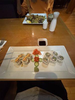 Spicy salmon roll and California roll and steak noddles