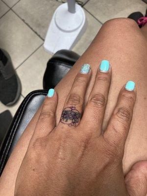 Finger tattoo