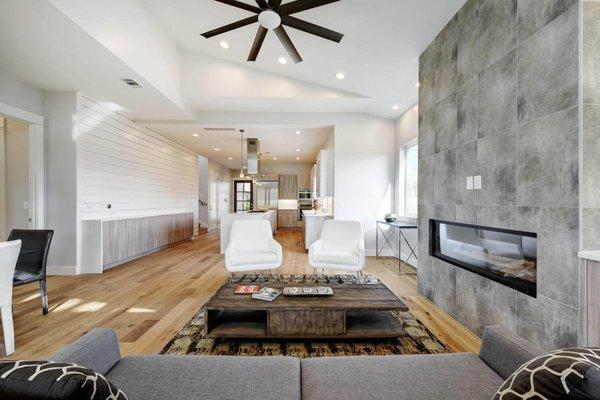 Contemporary Living Room With Tiled Wall