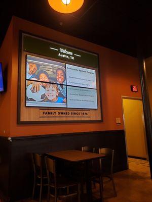 Video screen in restaurant