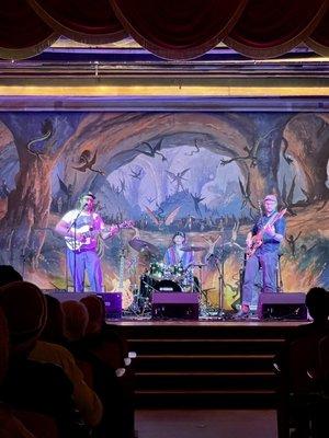 The band "The Stacks" playing in front of the awesome hellscape backdrop