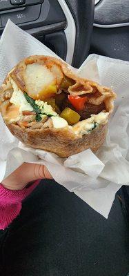 Whole Wheat Wrap with home fries, onions , peppers, egg whites and Spinach