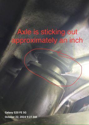 This picture shows the axle visibly sticking out. Driving with this gap caused fluid to leak.