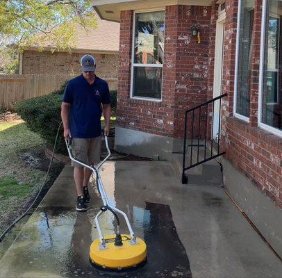 Surface cleaning a patio removing black mildew