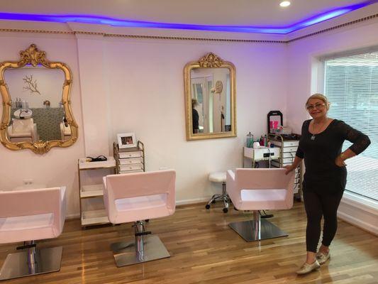 Kathy smiling and ready to welcome you to her new salon!