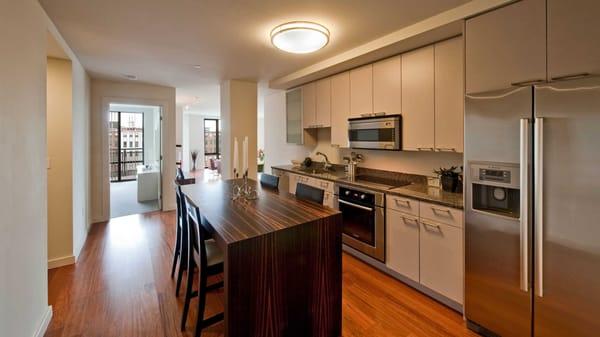 Open kitchen with stainless steel appliances