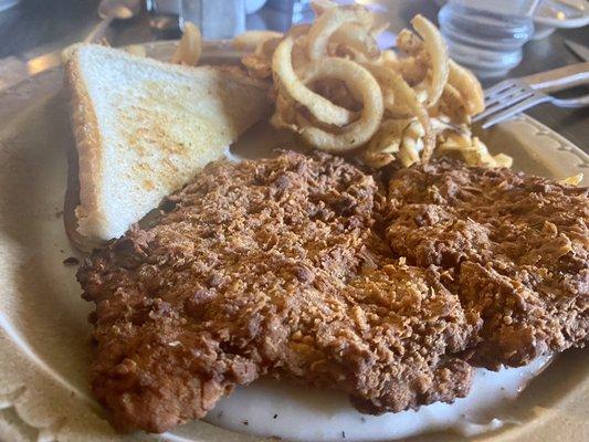 Chicken fried steak with Cajun fries