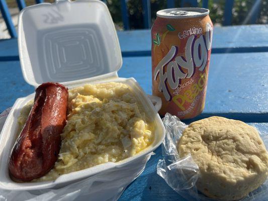 Country Boy sausage, grits, scrambled eggs, biscuit, and a peach Faygo. Breakfast of champions!